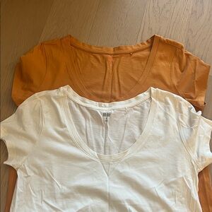Uniqlo 100% cotton Tshirts 
White and orange short sleeve